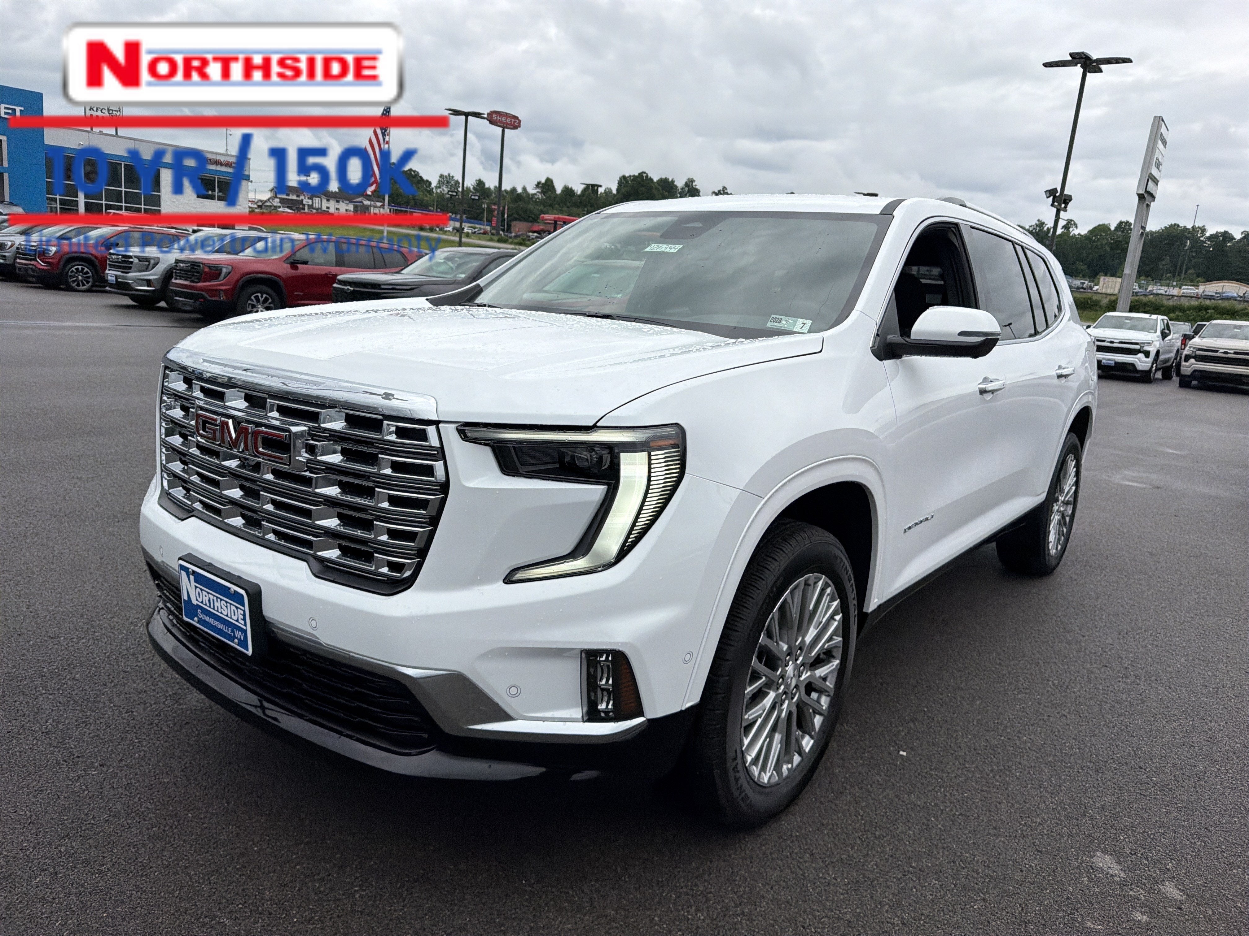 2026 GMC Acadia Denali in Summit White — front three-quarter view