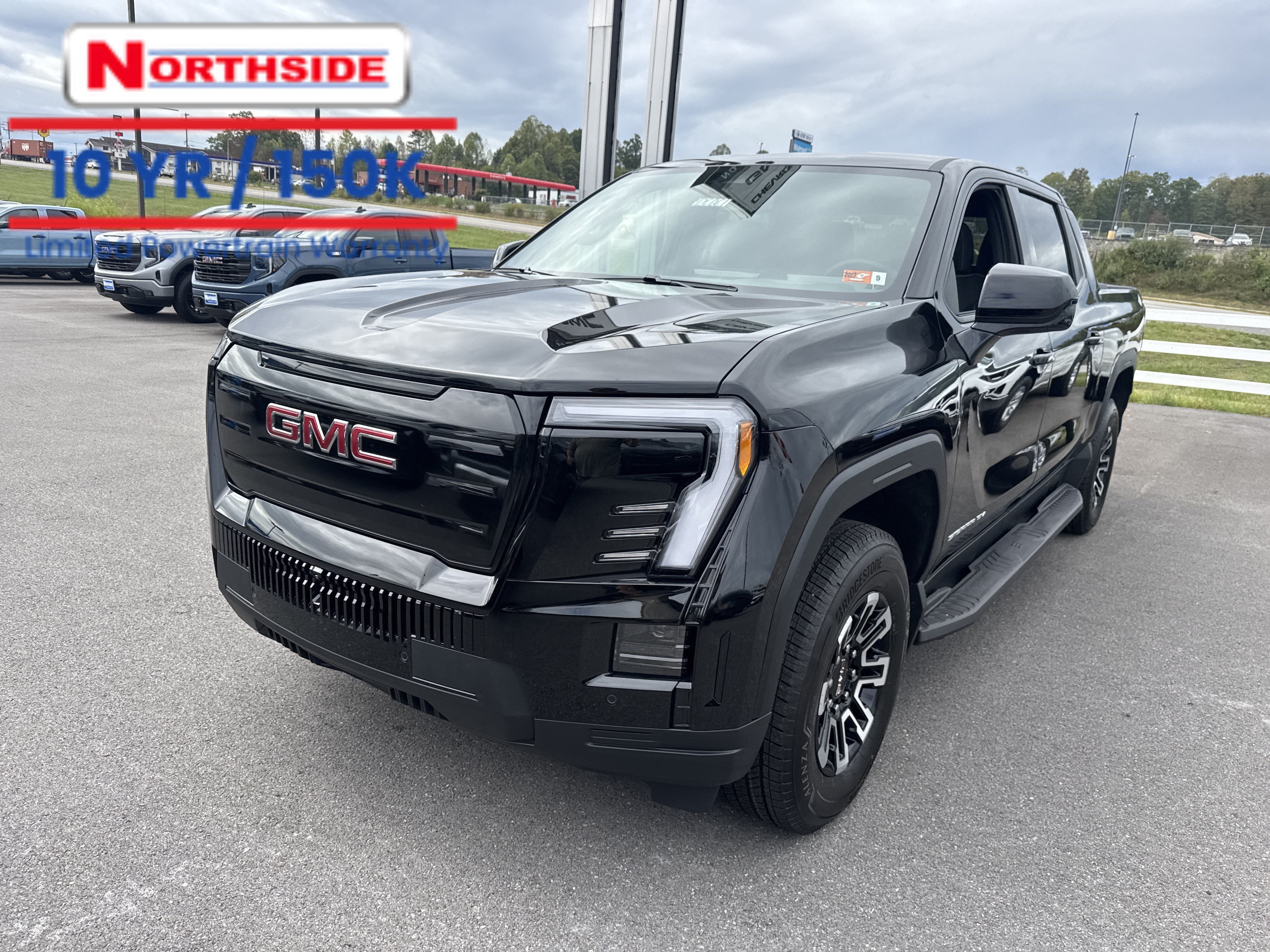 2026 GMC Sierra EV Elevation Extended Range in Onyx Black — front three-quarter view