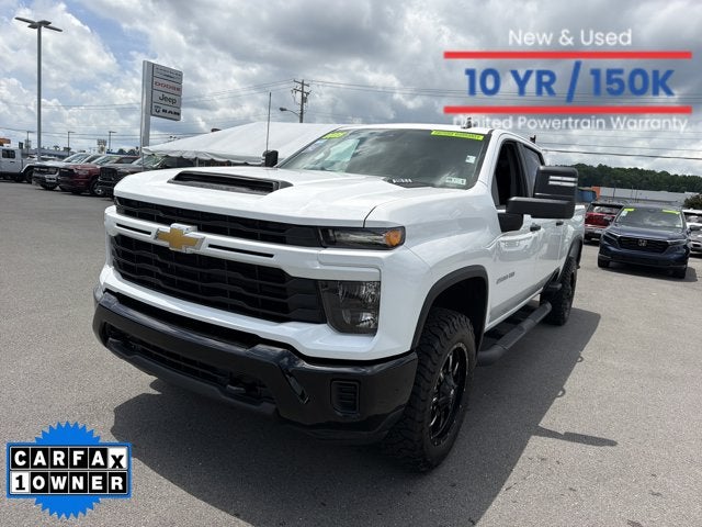 2025 Chevrolet Silverado 2500HD Custom in Summit White — front three-quarter view