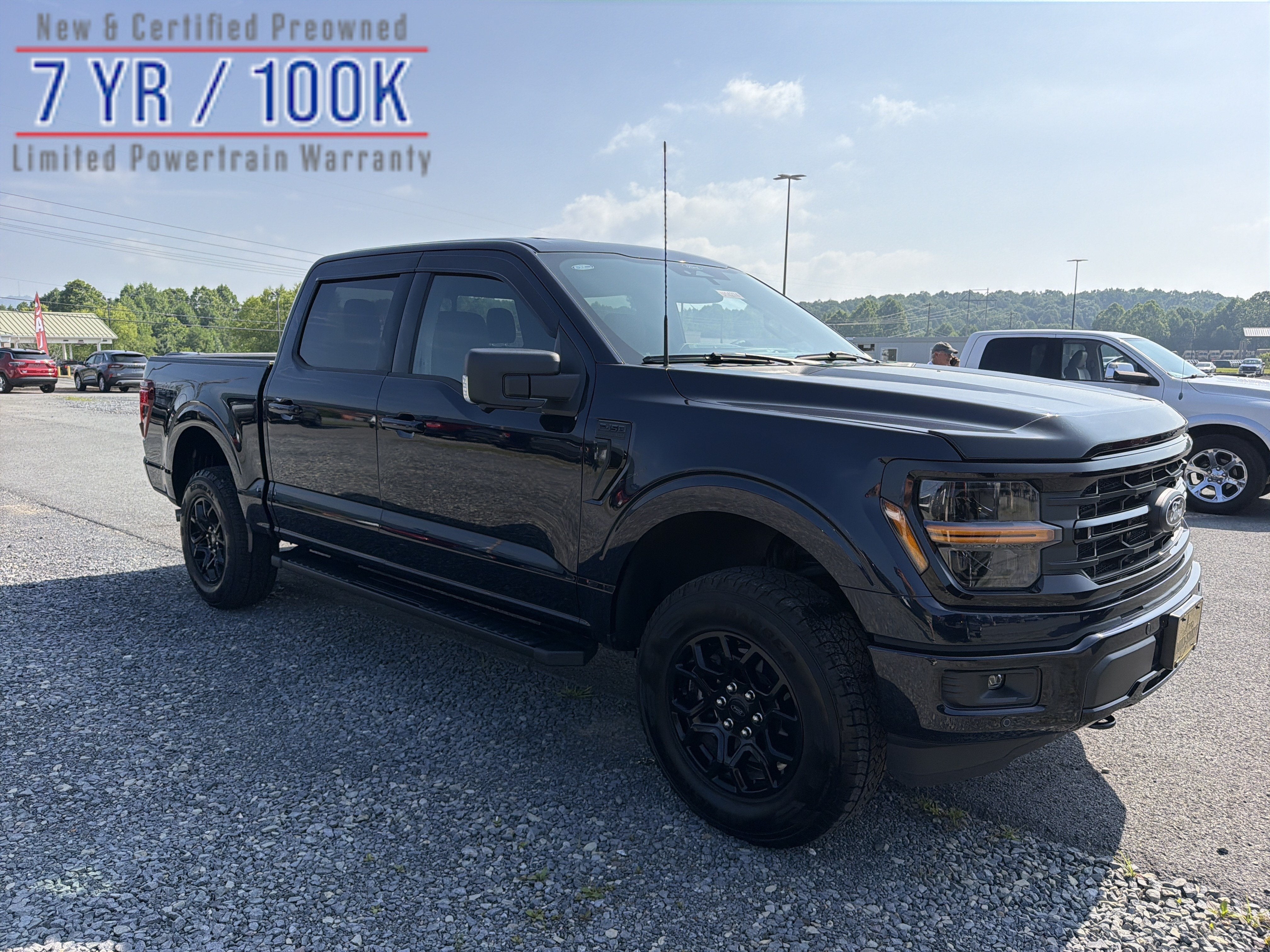 2025 Ford F-150 XLT in Blue Metallic — front three-quarter view
